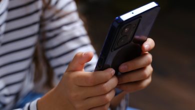 the hands of a child holding the HMD Fuse